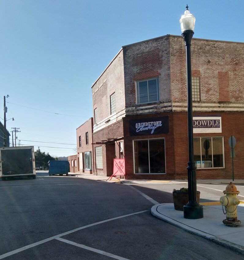 An old public square building gets renovated. Welcome, Grindstone Cowboy!