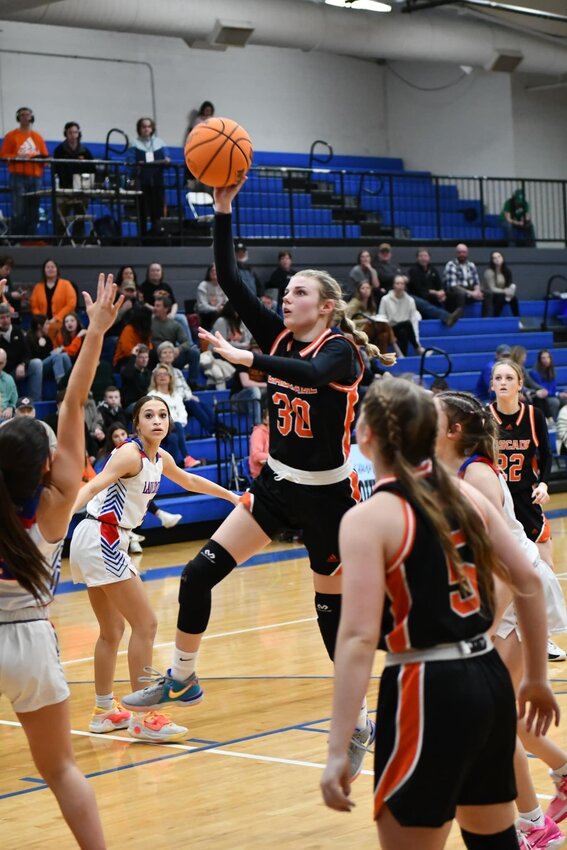 Suzanna Crews (30) floats up two of her 15 points in Tuesday's win at Chapel Hill.