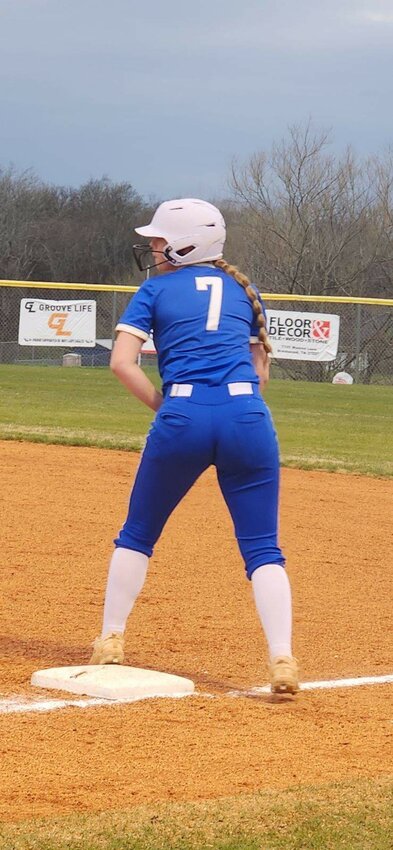 Sydney Moore (7) tallied an RBI in the six-run 5th inning.