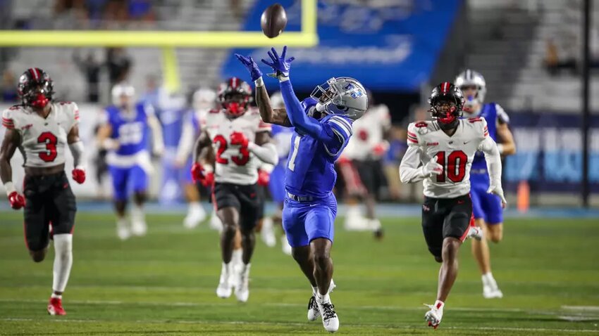 Omari Kelly (1) scored both of MTSU's touchdowns against WKU on Saturday night.