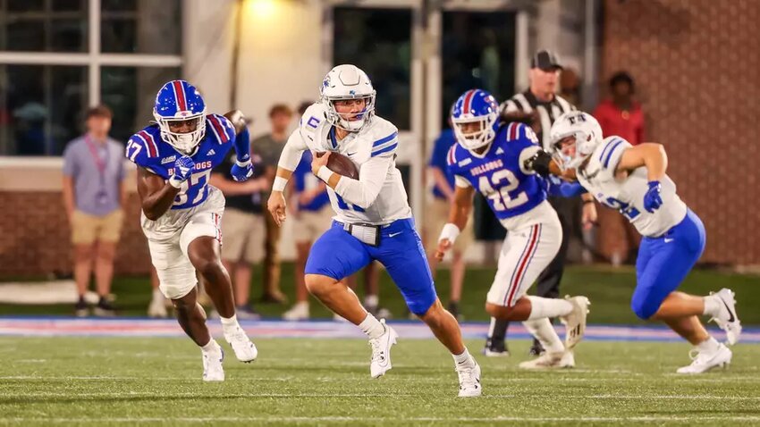 Nick Vattiato scrambles against LA Tech on Thursday night.