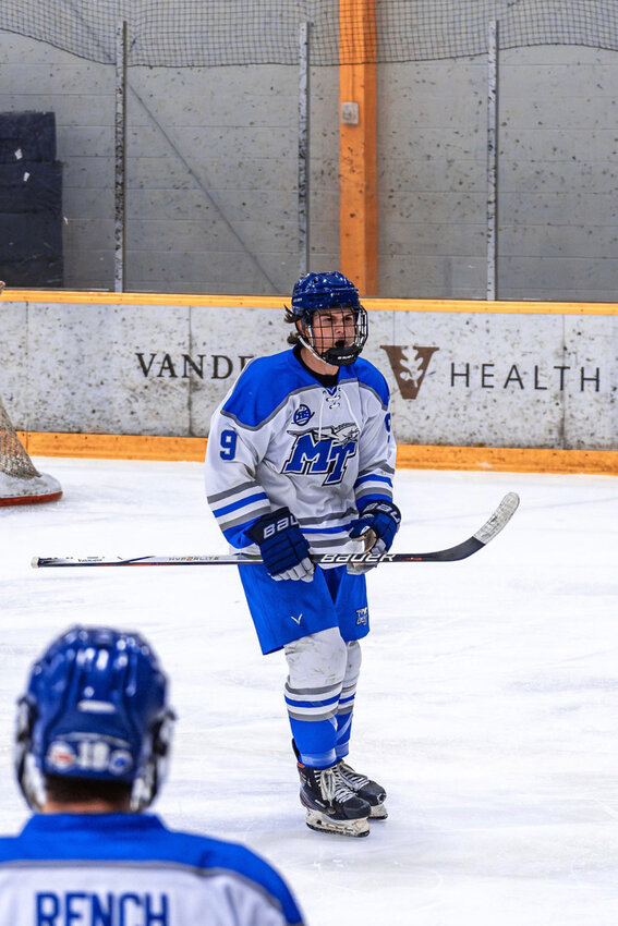 Middle Tennessee State University’s Linden Palmer (9), a senior from Lebanon, Tenn., and MTSU ice hockey team captain, president and winger, lets out a scream during a game last season.