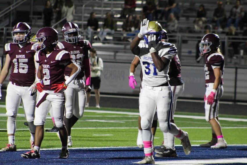 Robert Bailey (31) celebrates following one his of three rushing TDs against Spring Hill on Friday. He ran for over 150 yards on just 16 carries.