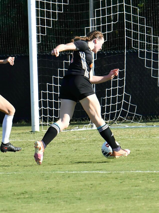 Ellie Chapa (27) scores Cascade's first-ever State Tournament goal.
