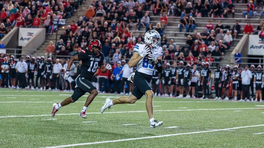 MTSU's Holden Willis (83) on his way to the end zone for a 61-yard TD on the Blue Raiders' opening drive on Wednesday night. Willis finished the night with 6 catches for 109 yards and 1 TD.
