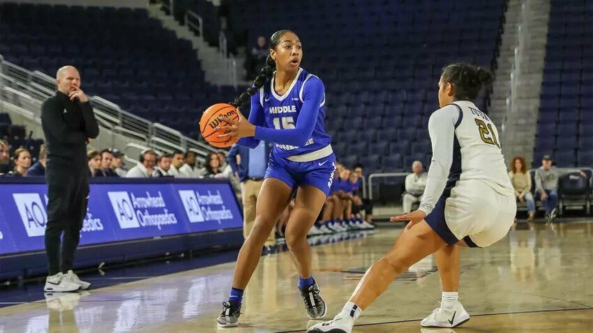 Ta'Mia Scott (15) connected on a pair of three-pointers en route to 12 points on the road at Cal Baptist in Tuesday night's blowout win.