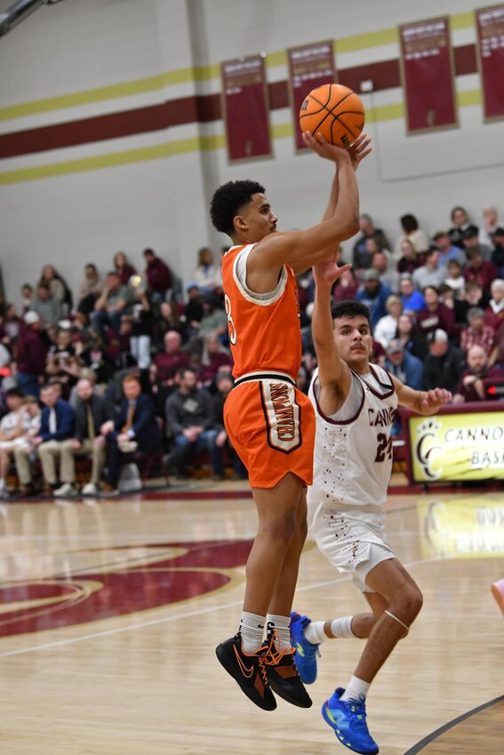 Jason Cullum (3) scored a team-high 21 points, including connecting on a pair of buzzer-beating three-pointers in the first half of the Champions 14-point District 9-AA road defeat on Friday night.