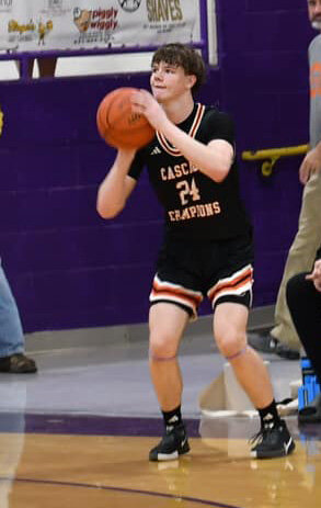 Tyler Barrett (24) fires away from downtown at Grundy County. Barrett connected on five three-pointers and finished tied for a team-high 16 points in Monday's District 9-AA road loss.