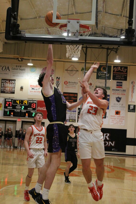 Karson Boyce (55) scores two of his six points in Friday's loss at Richland.