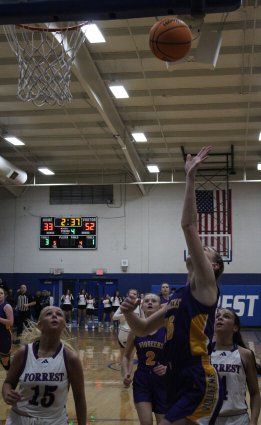 Community Viqueens' Senior Taylar Wessner (15) hits a layup for two of her 11 points in Community's District 9-AA win over Chapel Hill, 56-40, on Friday.