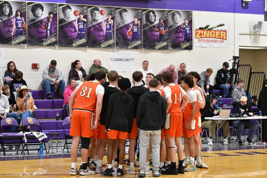 Cascade huddles during a timeout in Friday's Semifinal loss to Grundy County. The Champs struggled to find consistent offense, shooting less than 30% for the first time this season in district play against the Yellow Jackets.