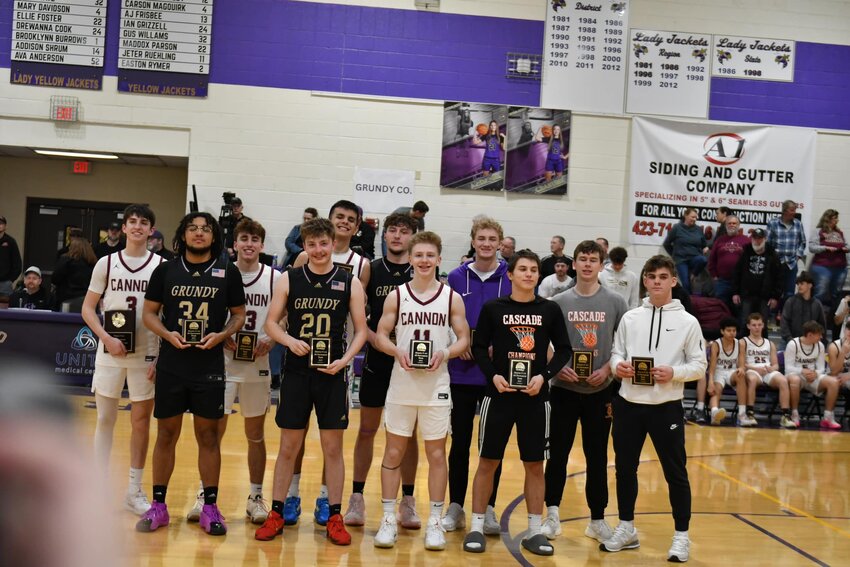 Cannon County's Eli Pelham (3), Lukas Phillips (23), Antonio Jones (24), and Miles Alexander (11), Grundy County's Sam Parson (15), Nate Roberts (20), and Reece Strong (34), Cascade's Henry Stone (grey, 10) and Tyler Rodgers (black, 25), and Community's Landon Lovvorn (purple, 11) and Charlie Haskins (white, 3) were named to the District 9-AA All-Tournament team on Monday night.