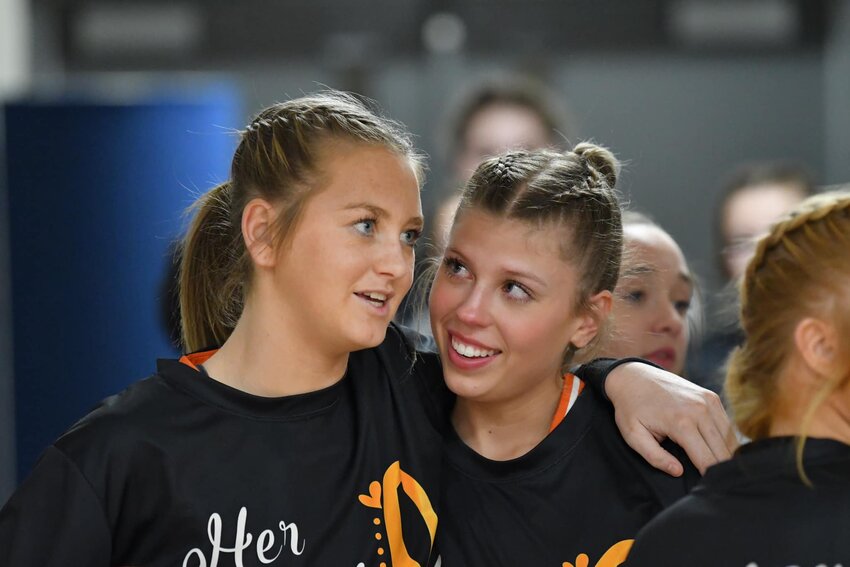 Kaegan Young (left) and senior Kaydence Miller (right) share a lighthearted moment before taking on Summertown on Monday night. Young finished with a game-high 18 points and also pulled down seven rebounds.