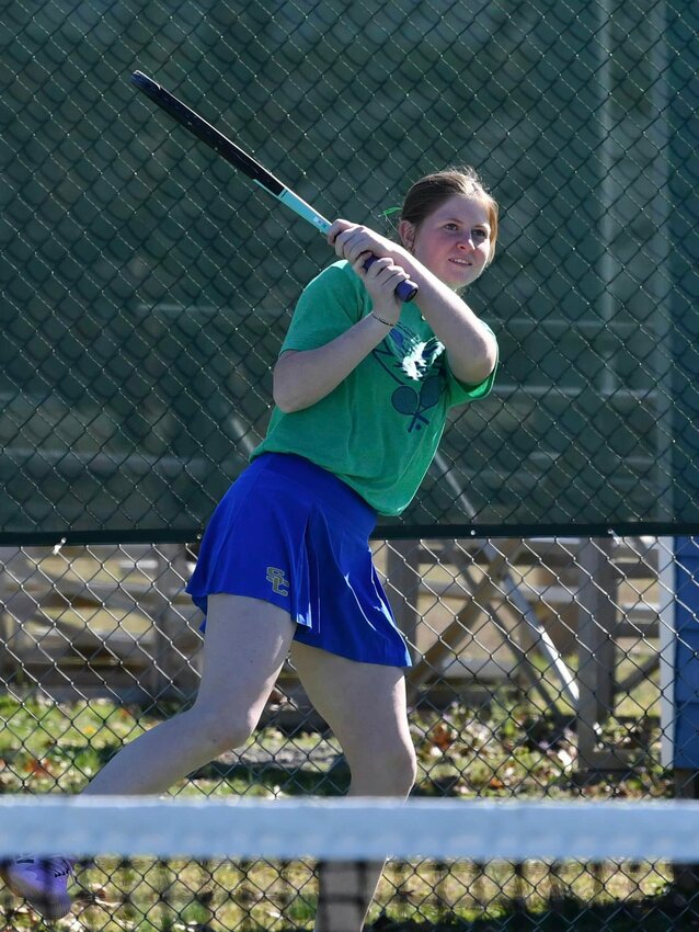Sophie Ray (pictured) returns with a backhand on Monday. Ray was part of the doubles pairing win with Lilly Smith, 8-1, and she made swift work of her singles matchup, winning 8-0.
