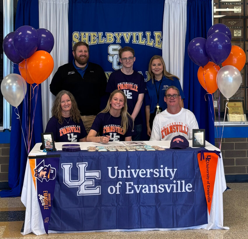 Grace Moody (pictured, middle) officially signed with the University of Evansville on Thursday, April 3, becoming the first member from the Bedford County Swim Team to continue her career at the collegiate level in the process.