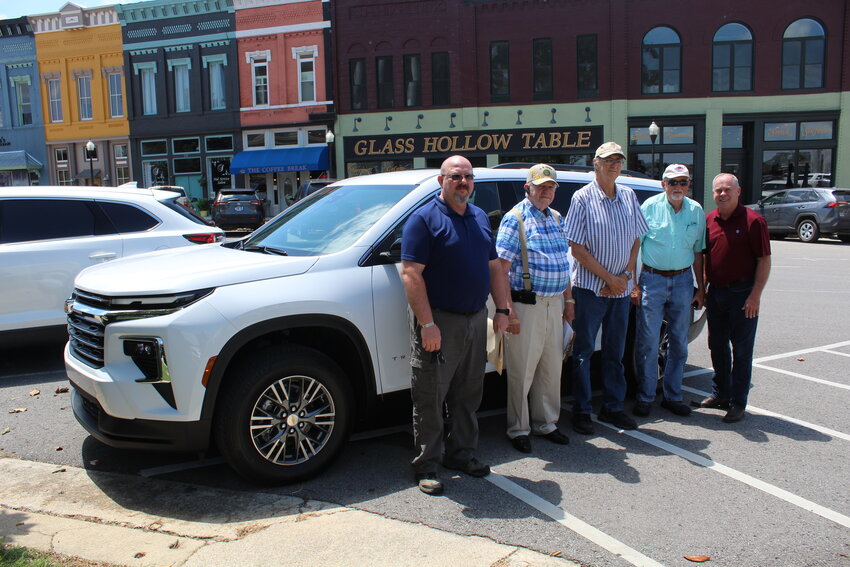 Inspecting the new vehicle are, from left, County Veterans Service Officer Benjamin Eley; Bill Tucker, the lead driver for the Veterans Office; Jim Painter, outgoing commander of the Veterans of Foreign Wars (VFW), who was chair of the Veterans Council at the time the project was approved; Gary Leverette, representing the American Legion; and County Mayor Chad Graham. Not pictured are American Legion commander Tim Estes and Disabled American Veterans (DAV) commander Brian Melton.