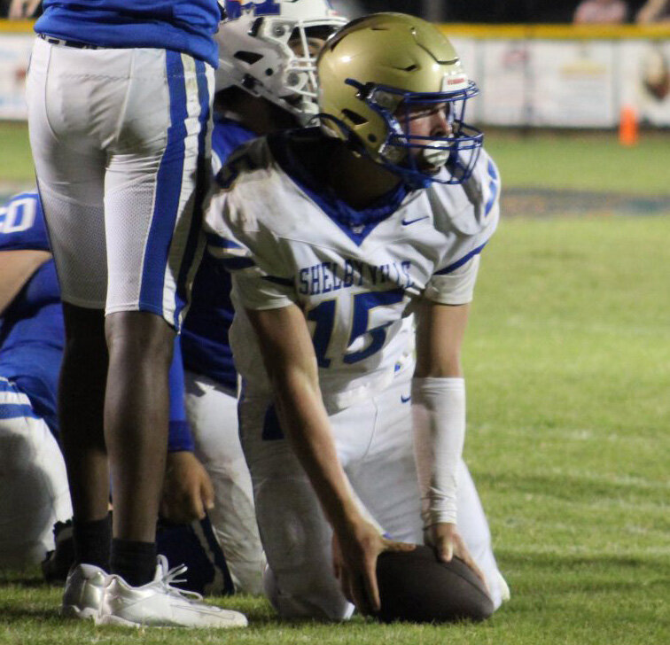 Stephen Bobo (15) accounted for two passing touchdowns along with one rushing touchdown in Friday's loss at Marshall County.