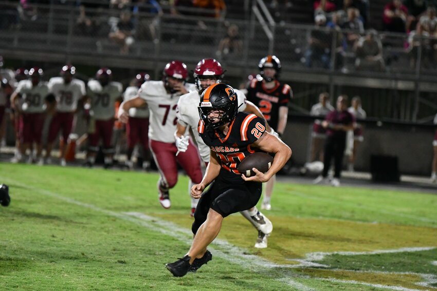 Nate Zimmerman (20) ran for 107 yards and 2 TDs on 25 attempts in the loss at Summertown on Friday night.