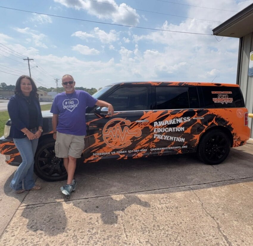 See the heart wrenching and yet positive story of CHASEAWAYFENTANYL in the 9/18 edition of the Times-Gazette.  Husband and wife team and owners of 580 Graphics, Cathy and John Long, recently wrapped for free Alan Vickers' car for his nonprofit CHASEAWAYFENTANYL. Alan is shown with Cathy after just picking up his vehicle this week.