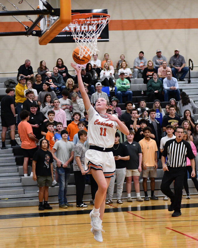 Lizzie Keele (11) lays in two of her game-high 22 points in Friday's win over Eagleville