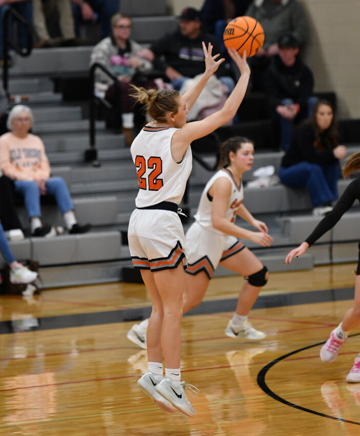Kaegan Young (22) knocks down one of her three triples in Monday's hotly-contest win over the Lady Tigers. Young finished with a gam-high 21 points.