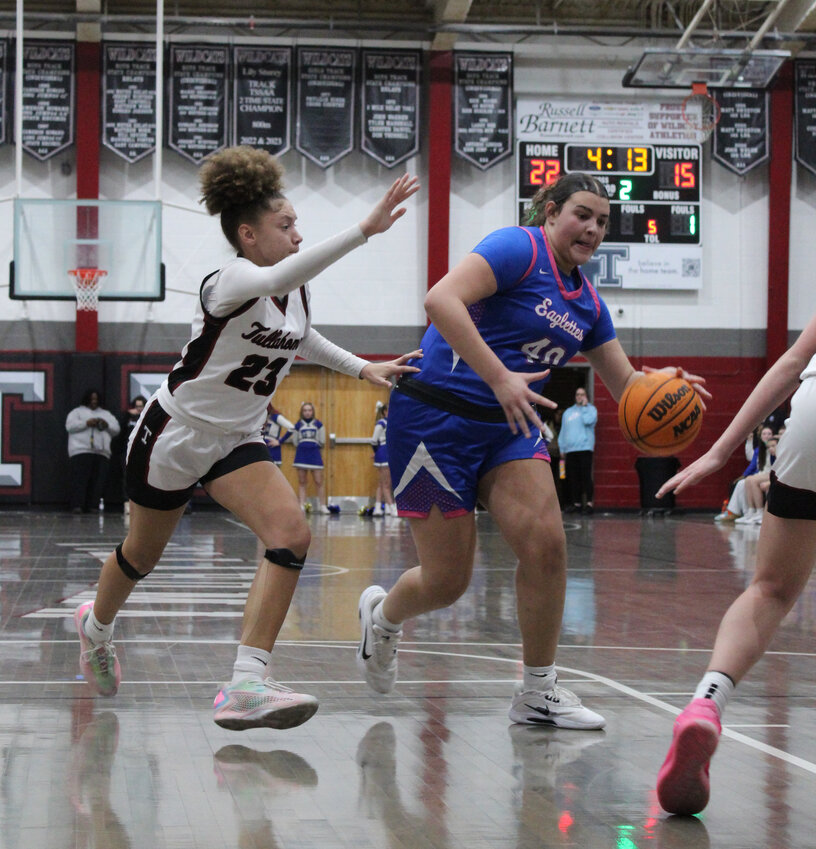 Jada Berry (40) attacks the basket at Tullahoma. Berry led the Eaglettes with a team-high 19 points in Tuesday's loss.