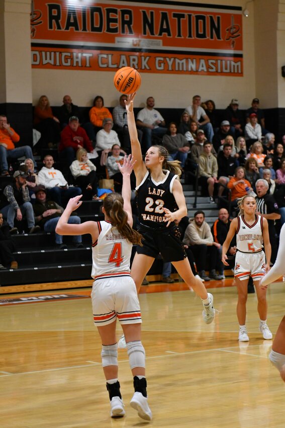 Kaegan Young (22) floats in two of her team-high 20 points in Saturday's non-district loss to #1 Richland.