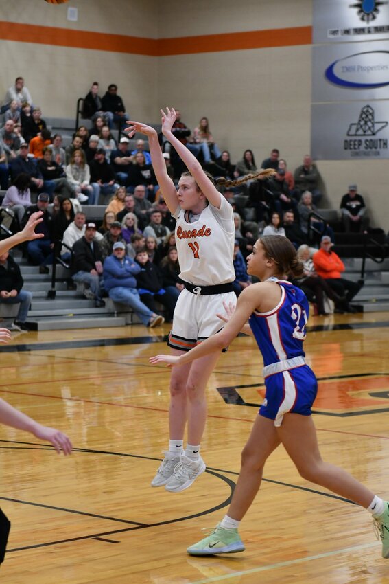 Lizzie Keele (11) knocks in two of her 14 points in Friday's district win over Chapel Hill.