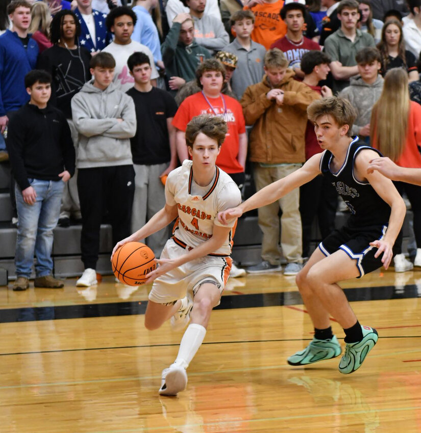 Tristin Billings (4) gathers to pull up from mid-range in the first half for two of his team-high 18 points in Thursday's loss to Summertown.
