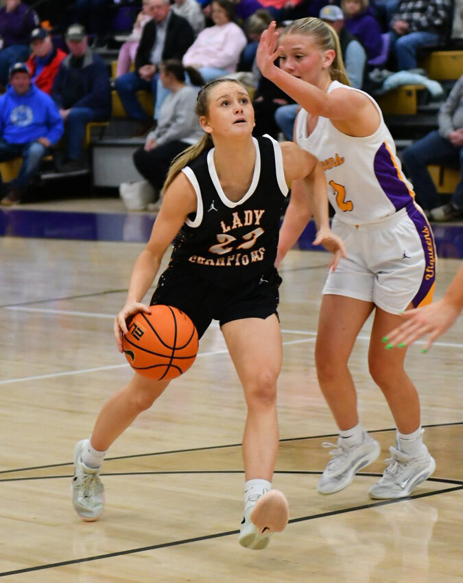 Cascade's Kaegan Young (22) drives on Community's Savannah Pearson (2) in the first meeting back on Jan. 13. Young is averaging nearly 20 PPG in five district games this year, and she put up 21 in a 5-point win at Unionville.