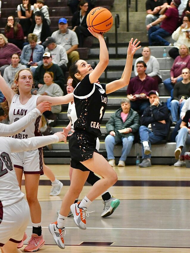 Cascade's Caroline Parker (5) lays in two of her game-high 20 points at Eagleville. Parker helped secure the Lady Champions' third 20-win season since 2001, and the first since 2018-19.
