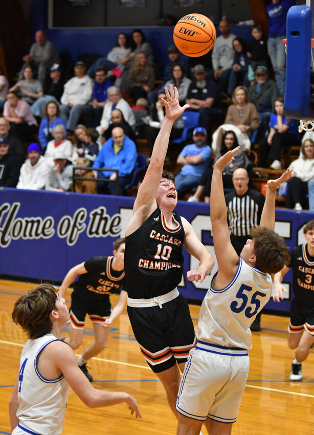 Cascade's Henry Stone (10) floats in two of his team-high 16 points on 7-of-9 shooting in Friday's loss at No. 10 Summertown. Stone also pulled down six rebounds.