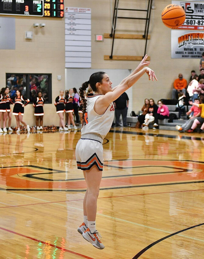 Cascade's Caroline Parker (5) pulls up for one of her two made three-pointers in the second half of the Lady Champions' loss to Summertown on Thursday. Parker finished with a tea,-high 16 points.