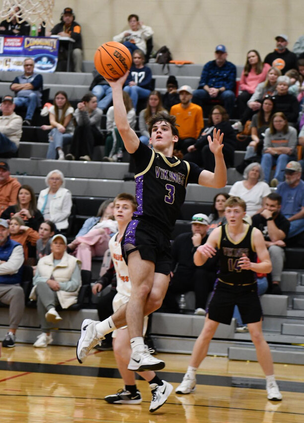 Community's Charlie Haskins (3) floats for two of his game-high 28 points in Saturday's win over Cascade.