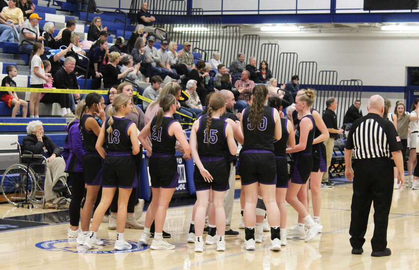 The Community Viqueens huddle during a timeout in the Region 5-AA Semifinal against Loretto on Monday. Community finishes the 2025-26 campaign at 16-14 overall.