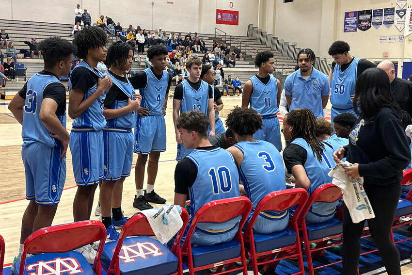 The Shelbyville Central Golden Eagles huddle during a timeout in the Region 3-AAAA Semifinal against No. 6 ranked Walker Valley on Tuesday. The Golden Eagles' exciting season ends at 19-13 overall.