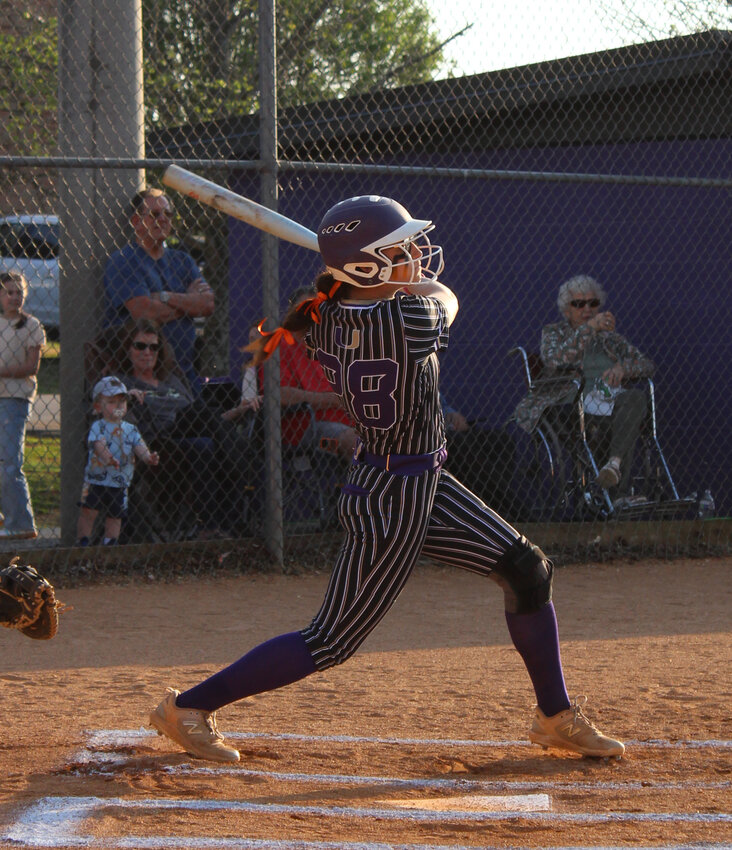 Community's Mattie Maxey (28) swings and drives her first home run of the night in Thursday's win over Cascade. Maxey finished 3-for-5 with two home runs and five RBIs.