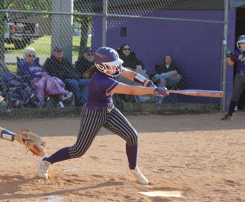 Community's Gracie Daniel (4) delivers an RBI-single in the first inning against Chapel Hill on Tuesday. Daniel went 3-for-4 at the plate with a team-high 3 RBIs in the win over the Lady Rockets.