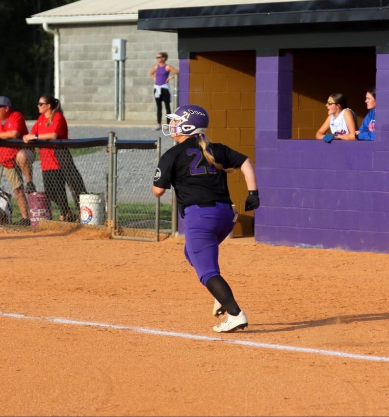 Community's Ryleigh Lassiter (21) runs to first base as she watches her leadoff home run give the Viqueens a 4-0 lead in the top of the second inning on Friday. Lassiter is second on the team with four round-trippers this season, and finished 2-for-3 at the plate in the win over Page.