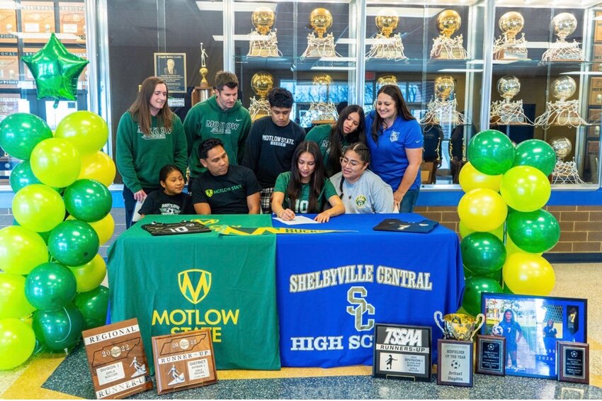 Shelbyville Central's Britzel Hayitin (center, 10) signed with Motlow State on Thursday, Feb. 12 to continue her soccer career.