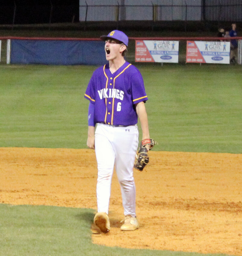 Community's Wes Haley (6) begins to celebrate after hauling in the final out of Monday's upset win at Chapel Hill.