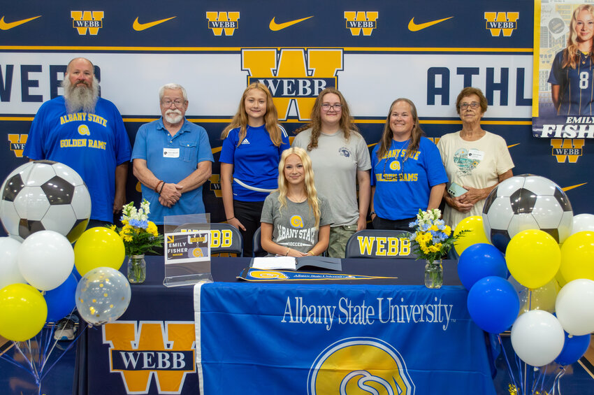 The Webb School's Emily Fisher (center) signed with Albany State University to continue her soccer career at the collegiate level.