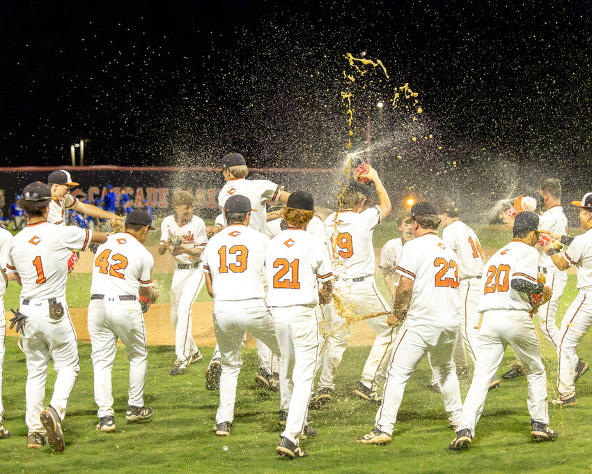 Cascade celebrates after punching its ticket to the State Tournament for the first time under Travis Sheffield.