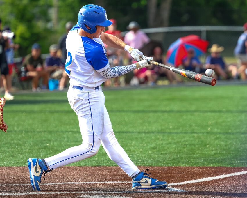 Shelbyville Central's Caden Peacock (2) delivers a 2-RBI single in the bottom of the third inning in Tuesday's loss to Ravenwood.