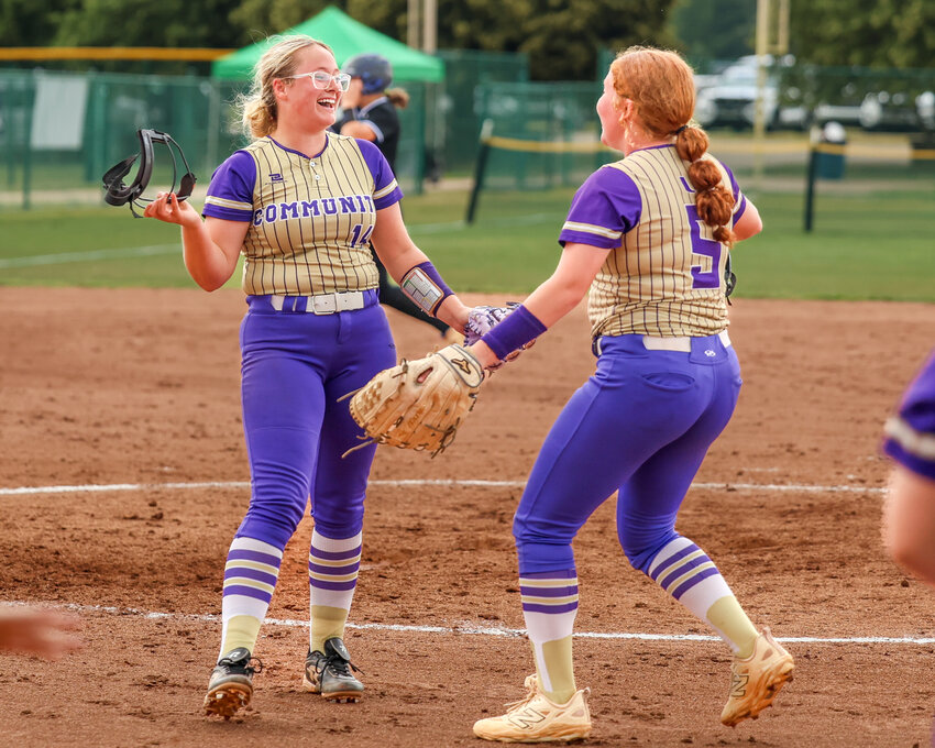 Community's ace Annie Prince (14) and first baseman Brooklyn Yoes (5) celebrate Prince's game-winning strikeout to leave the Unicoi bases loaded on Thursday afternoon.