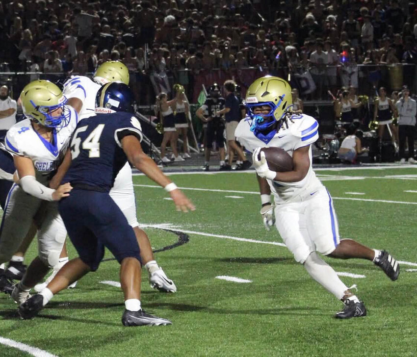 Shelbyville Central's Treyveon Mathis (0) runs against Independence. Mathis finished with a game and season-high 157 yards rushing and one touchdown on 21 carries despite Friday's loss.