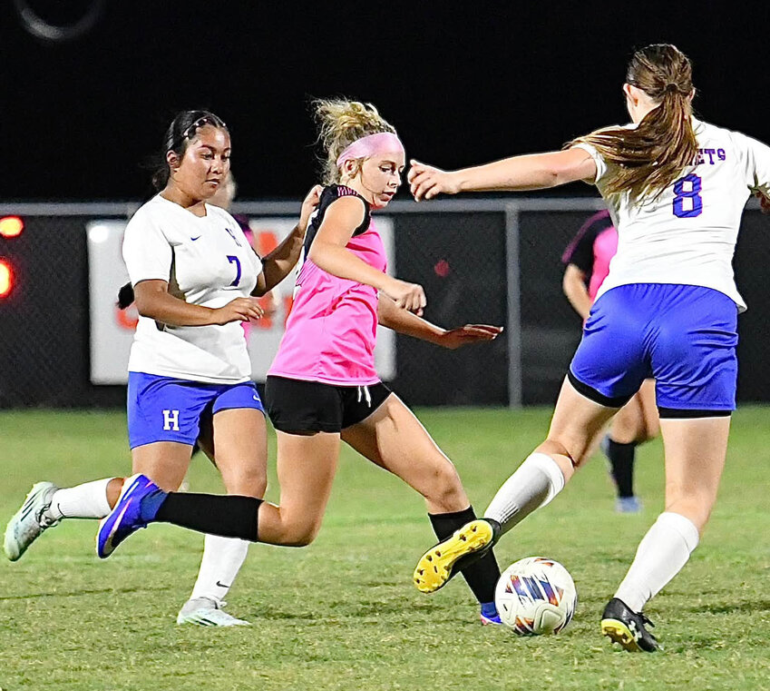 Cascade's Adalyn Nelms (12, pink) scored a hat-trick in the District 9-A Semifinal win over Huntland on Tuesday night.