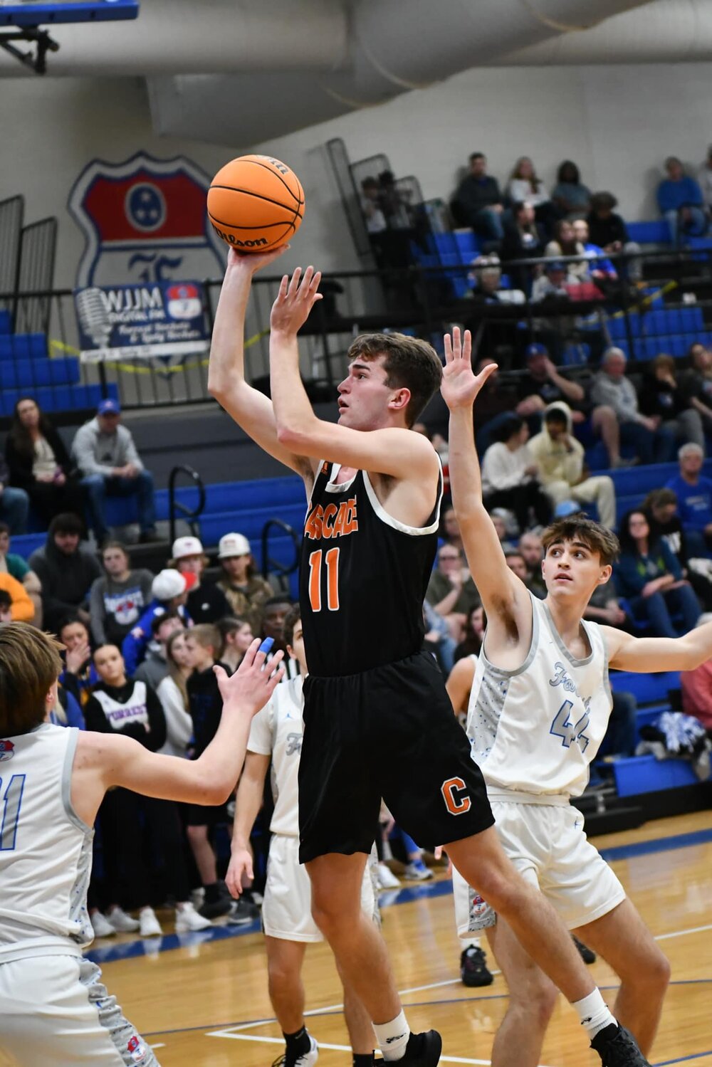 Zach Crosslin (11) floats in two of his game-high 12 points in Tuesday's win in Chapel Hill.