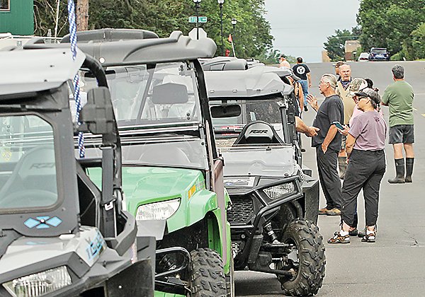 ATV enthusiasts gathered on the streets of Ely last month for a rally and ride to Babbitt.  Plans for a state ATV convention here, set for 
September, will be adjusted to reduce the risk of spread of COVID-19.