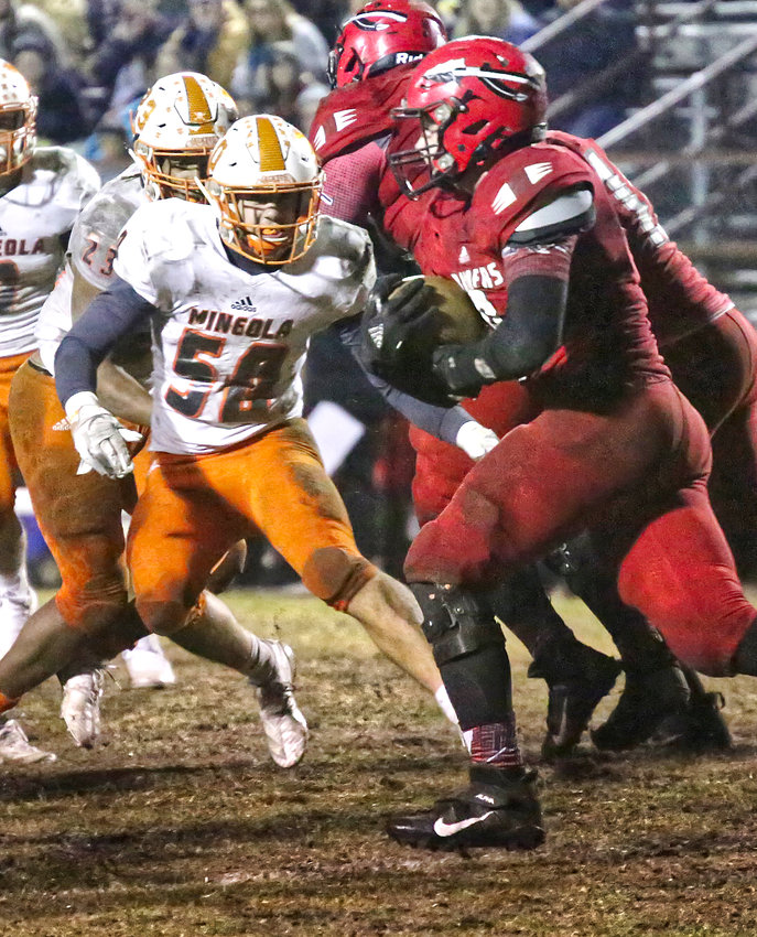 Mineola linebacker Hunter Wright battled Red Raider halfback Landry Deaton all night.